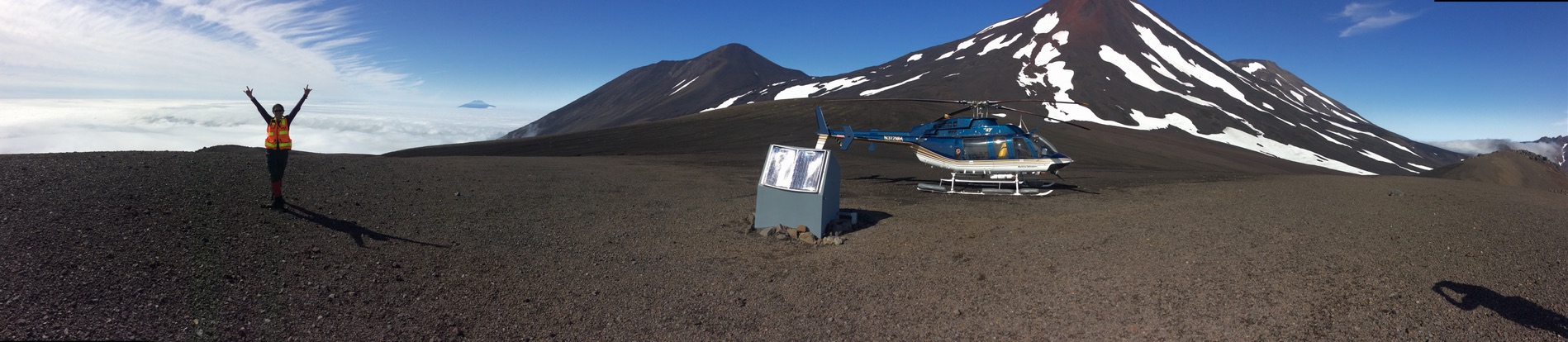 Liz, Seismic Station, and Helicopter on Tanaga Volcano